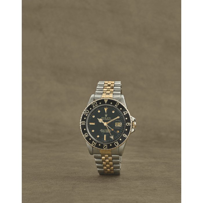 Rolex Rolex. Montre bracelet en or jaune 18K (750) et acier avec date et 2nd fuseau horaire mouvement automatique Rolex. A stainless steel and gold automatic calendar bracelet watch with dual time zone and nipple dial GMT-Master, Ref: 16753, Circa 1980 · 16753