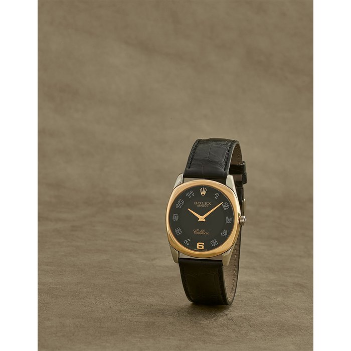 Rolex. Montre bracelet or jaune et blanc 18K (750) de forme coussin mouvement automatique Rolex. An 18K white and yellow gold manual wind cushion form wristwatch Cellini, Ref: 4233, Circa 2001