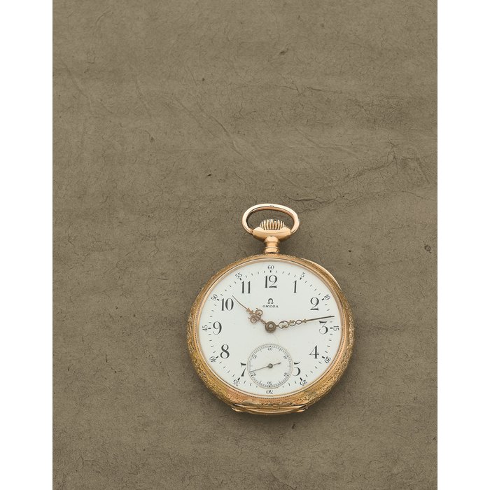 Omega. Montre de gousset à cadran ouvert en or jaune 18K (750) remontoir au pendant Omega. An 18K gold keyless wind open face pocket watch Circa 1910