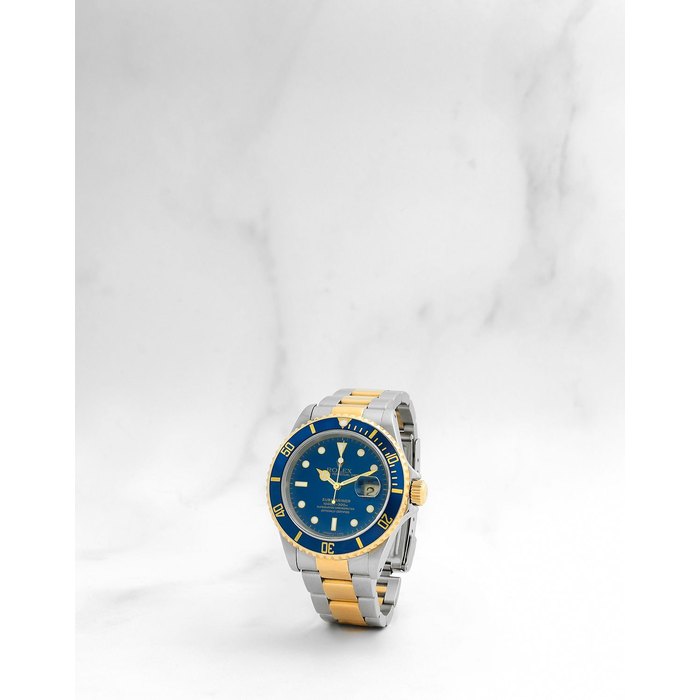 Rolex. Montre bracelet en or jaune 18K (750) et acier avec date mouvement automatique Rolex. A stainless steel and gold automatic calendar bracelet watch Submariner Date, Ref: 16613, Circa 1997