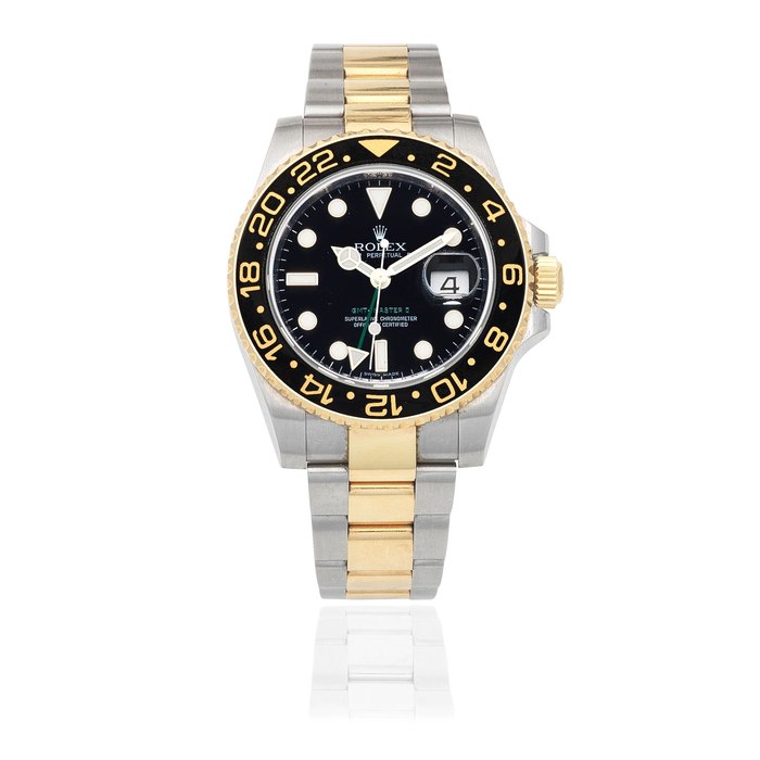 Rolex Rolex. A stainless steel and gold automatic calendar bracelet watch with dual time zone GMT-Master II, Ref: 116713LN, Purchased 21st December 2008, Price & Market Data