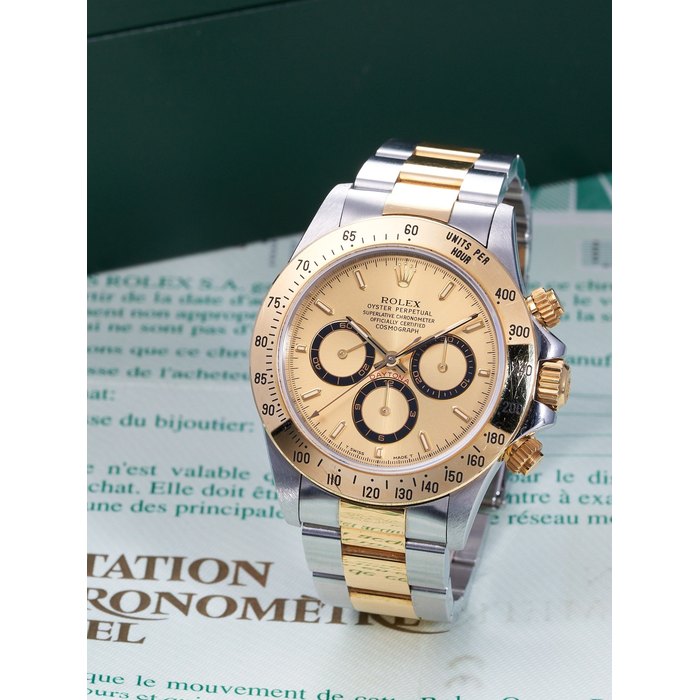 Rolex ROLEX | DAYTONA, REF.16523, A STAINLESS STEEL AND YELLOW GOLD CHRONOGRAPH BRACELET WATCH, CIRCA 1997, Price & Market Data