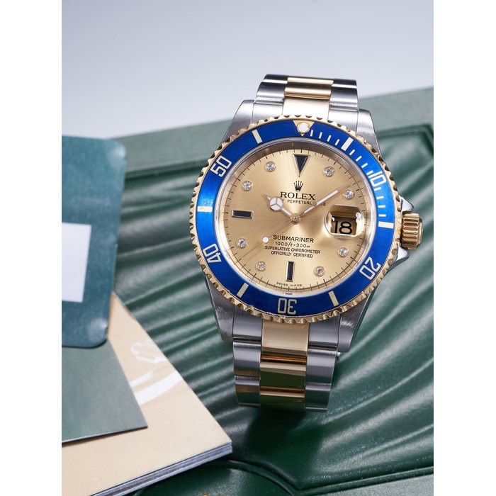 ROLEX | SUBMARINER, REF.16613T, A STAINLESS STEEL AND YELLOW GOLD BRACELET WATCH WITH DATE AND "SERTI DIAL", CIRCA 2017