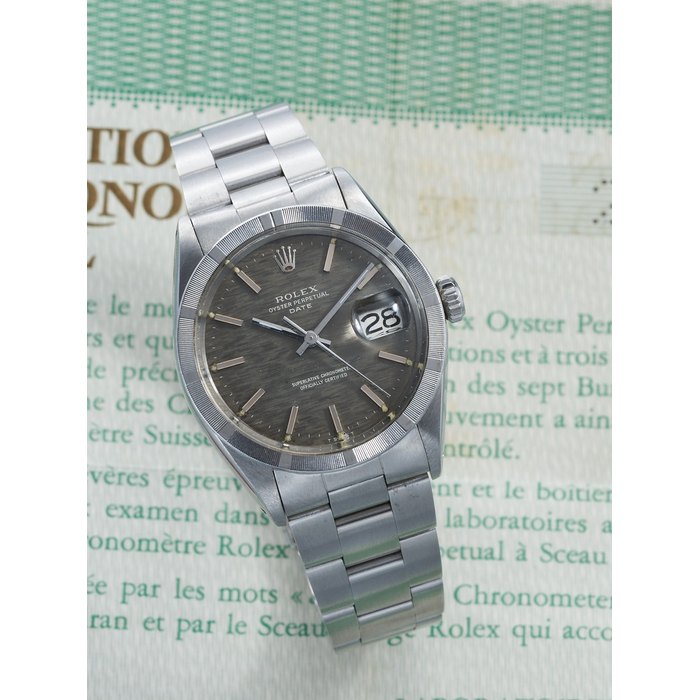 ROLEX | OYSTER PERPETUAL DATE, REF.1501, A RARE STAINLESS STEEL BRACELET WATCH WITH GREY MOSAIC DIAL AND DATE, CIRCA 1970