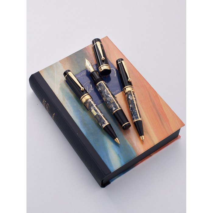 MONTBLANC | ALEXANDRE DUMAS, REF. 28706, WRITIERS SERIES, A SET OF THREE MARBLED AND GOLD PLATED WRITING INSTRUMENTS, CONSISTING OF A FOUNTAIN PEN, BALLPOINT PEN AND MECHANICAL PENCIL