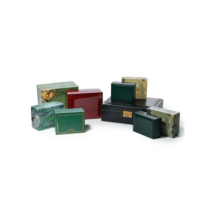 ROLEX | A GROUP OF FIVE VARYIYING PRESENTATION BOXES