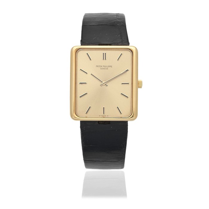 Patek Philippe. An 18K gold manual wind rectangular form wristwatch with sigma dial Ref: 3599, Circa 1970