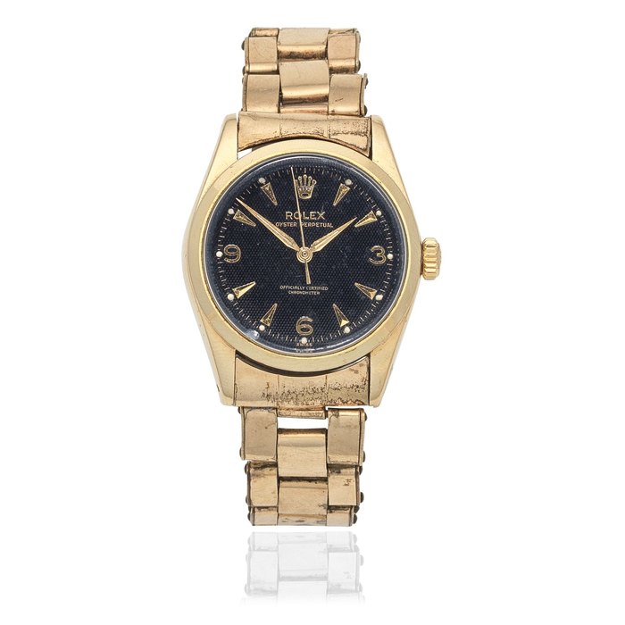 Rolex. A gold plated and stainless steel automatic bracelet watch Oyster Perpetual, Ref: 6334, Circa 1963