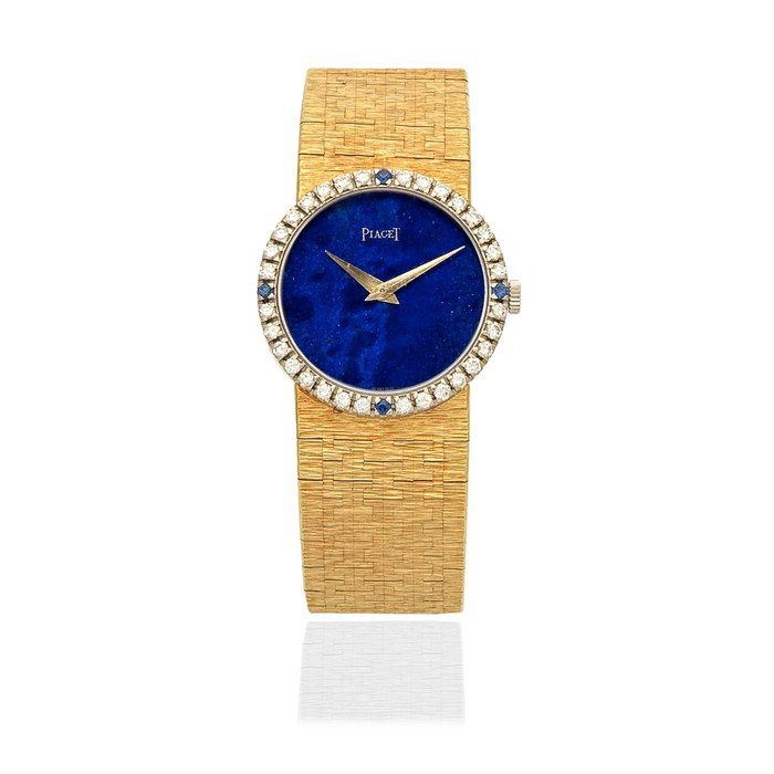 Piaget. A lady's 18K gold, diamond and sapphire set manual wind bracelet watch Ref: 9706 A 6, Circa 1970