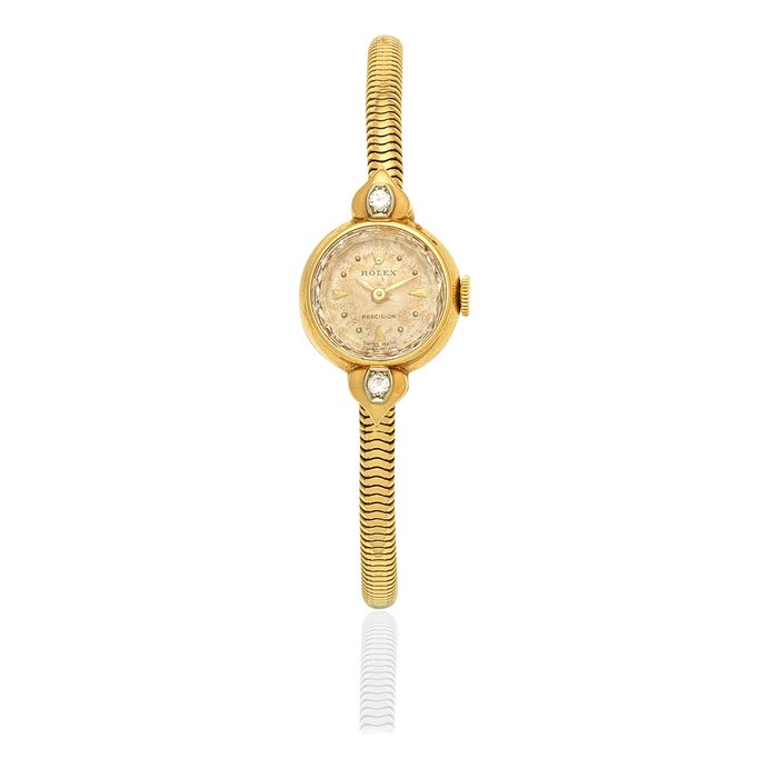 Rolex. A lady's 18K gold and diamond set manual wind cocktail bracelet watch Precision, Ref: 8391, Circa 1960