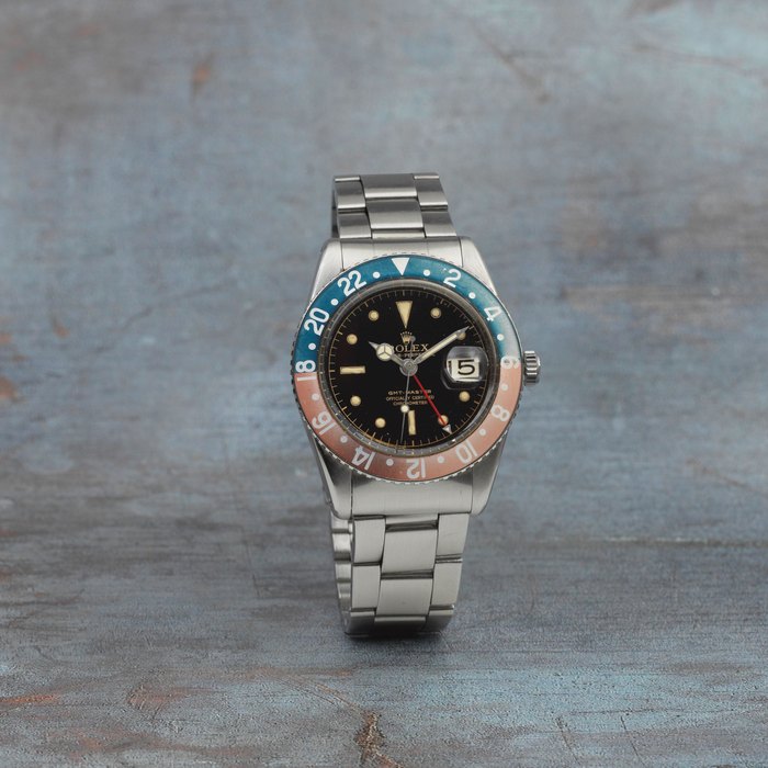 Rolex. A stainless steel automatic bracelet watch with gloss dial and roulette date wheel of historic interest having been used upon the Pegasus Overland Expedition of 1959 GMT-Master, Ref: 6542, Circa 1959