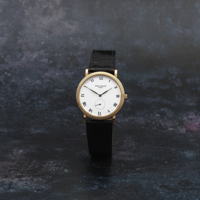 Patek Philippe. An 18K gold manual wind wristwatch Calatrava, Ref: 3919, Circa 1995