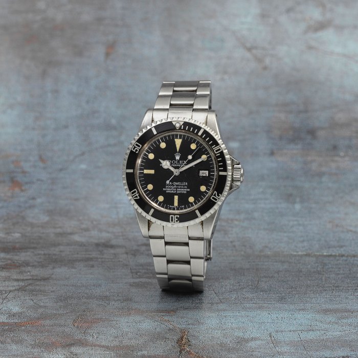 Rolex. A rare stainless steel automatic calendar bracelet watch with 'rail dial' Great White Sea Dweller, Ref: 1665, Circa 1979