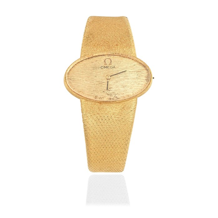 Omega. An 18K gold manual wind oval form bracelet watch (AF) Circa 1980