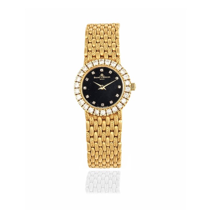 Baume & Mercier. A lady's 18K gold and diamond set quartz bracelet watch Ref: 166519, Circa 1980