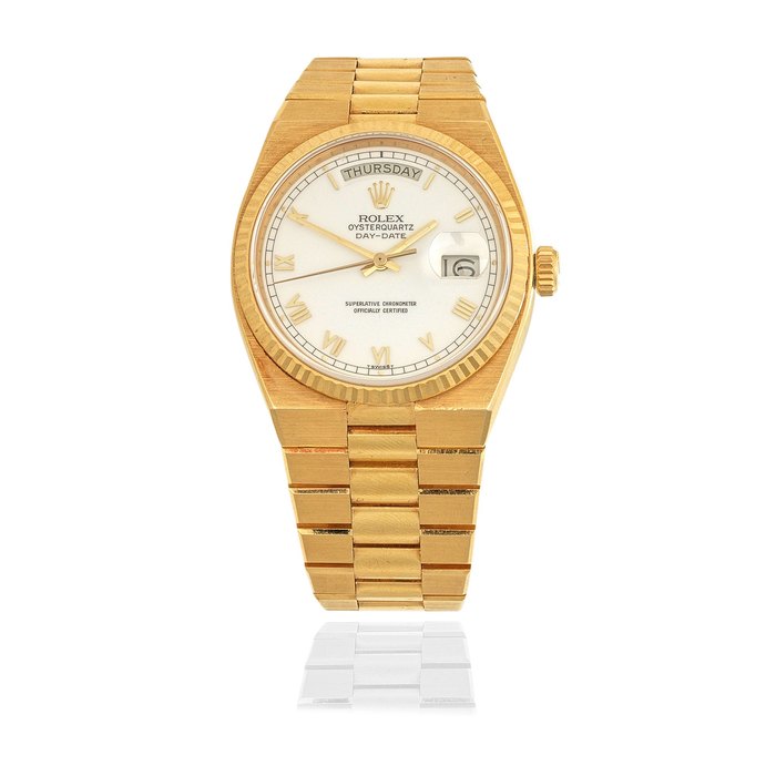 Rolex. An 18K gold quartz calendar bracelet watch Oysterquartz Day Date, Ref: 19018, Circa 1978