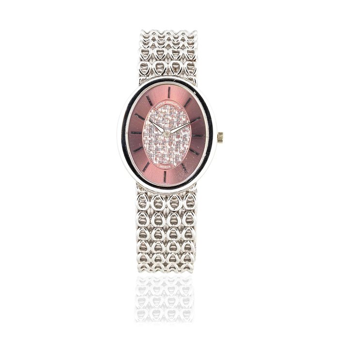 Patek Philippe. An 18K white gold manual wind bracelet watch with sigma dial Golden Ellipse, Ref: 3598, Circa 1970
