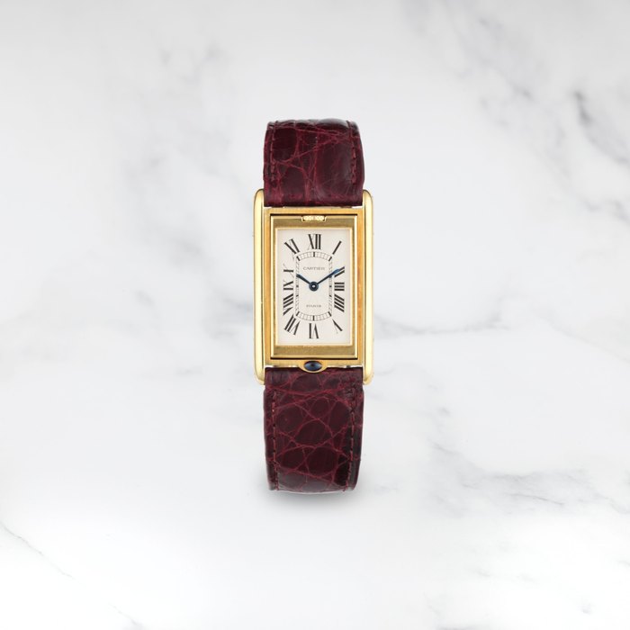 CARTIER. MONTRE BRACELET EN OR JAUNE 18K (750) RECTANGULAIRE ET REVERSIBLE MOUVEMENT MECANIQUE CARTIER. AN 18K GOLD MANUAL WIND REVERSIBLE RECTANGULAR WRISTWATCH Tank Basculante, Circa 1990