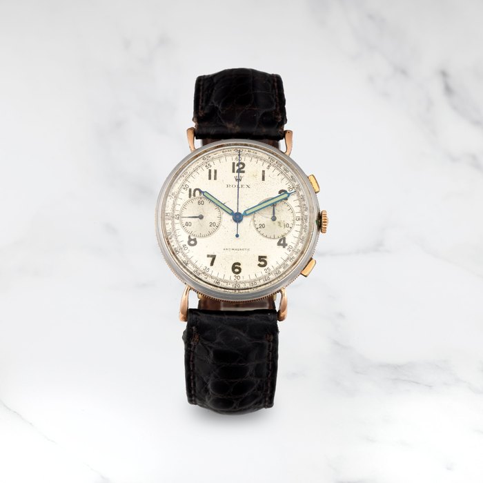ROLEX. RARE CHRONOGRAPHE BRACELET EN METAL DORE ET ACIER MOUVEMENT MECANIQUE ROLEX. A RARE STAINLESS STEEL AND GILDED METAL MANUAL WIND CHRONOGRAPH WRISTWATCH Antimagnetic, Ref: 4062, Circa 1938