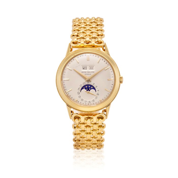 PATEK PHILIPPE. AN EXCEPTIONAL AND RARE 18K GOLD PERPETUAL CALENDAR BRACELET WATCH WITH MOON PHASERef: 3448, c.1960s