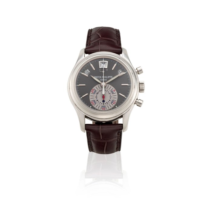 PATEK PHILIPPE. A FINE PLATINUM AUTOMATIC ANNUAL CALENDAR CHRONOGRAPH WRISTWATCH WITH POWER RESERVERef: 5960P-001, Sold 13th October, 2009