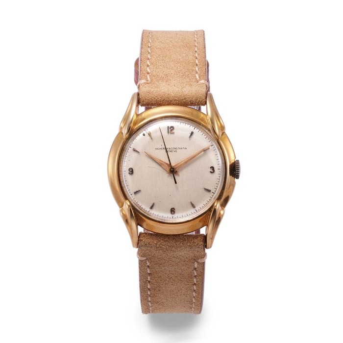 VACHERON & CONSTANTIN. A YELLOW GOLD WRISTWATCH WITH SHAPED LUGS, CIRCA 1945