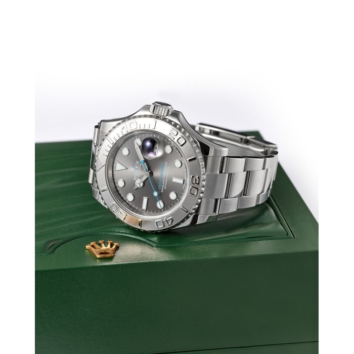 ROLEX | REF.116622 YACHT-MASTER, A STAINLESS STEEL BRACELET WATCH WTH PLATINUM BEZEL AND DATE, CIRCA 1995