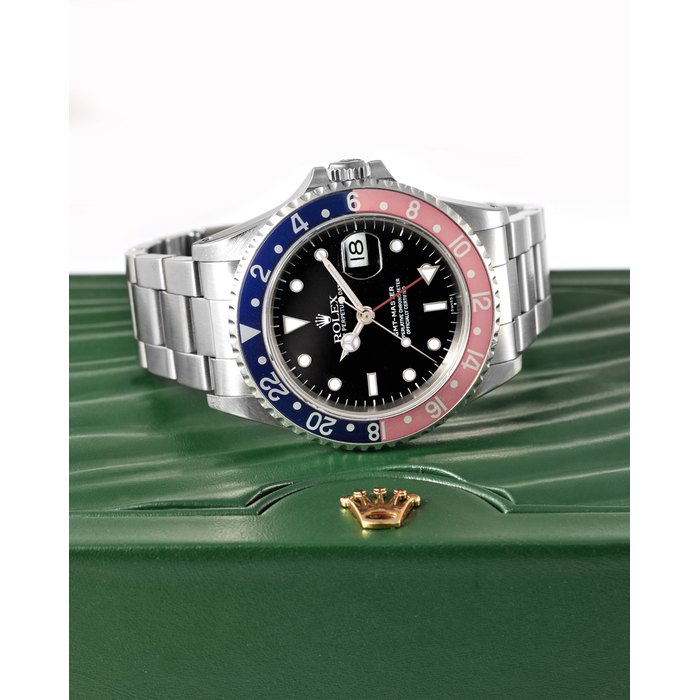 ROLEX | REF.16700 GMT-MASTER, A FINE STAINLESS STEEL GMT BRACETLET WATCH WITH DATE, CIRCA 1997