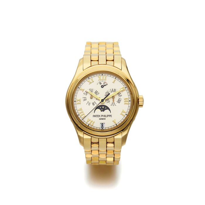 Patek Philippe | Ref. 5036/1J, A Fine and Rare Yellow Gold Annual Calendar Bracelet Watch with Moon-phases and Power Reserve Indication, Circa 2005