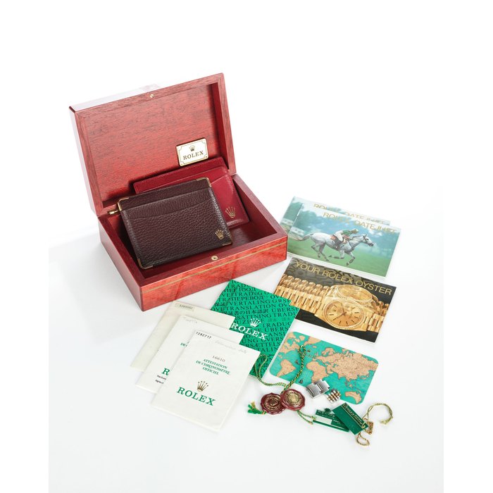 Rolex Rolex | Accessories. A Collectible Group of Two Steel Oyster Links, Wood Presentation Box, Certificates, Booklets, leather wallets and swing tagsBox, Certificates, Booklets, Links and Tags, Price & Market Data