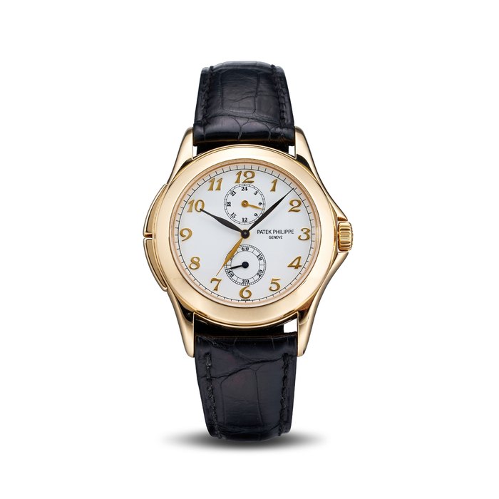 Patek Philippe. A Fine 18K Yellow Gold Manual Winding Dual Time Wristwatch Travel Time, Ref: 5134J-001, Sold 24th of December, With travel pouch