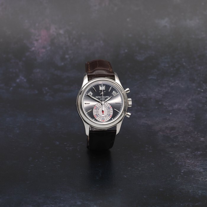 Patek Philippe. A fine platinum automatic annual calendar chronograph wristwatch with power reserve Ref: 5960P-001, Purchased 9th October 2007