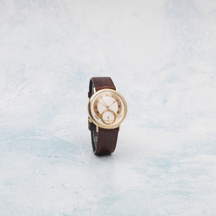 George Daniels. An exceptional, fine and rare 18K gold Limited Series automatic centre seconds wristwatch with co-axial escapement Millennium, Made in 1999