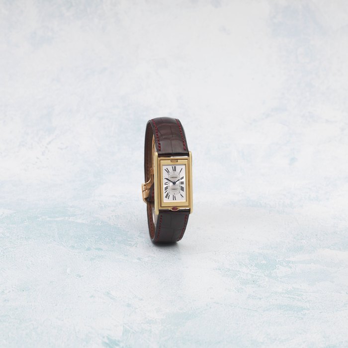 Cartier. A Limited Edition 18K gold manual wind reversible rectangular wristwatch Tank Basculante 150th Anniversary 'I Love Cartier' Collection Privee, Limited Edition No.18/150, Purchased 25th May 1997