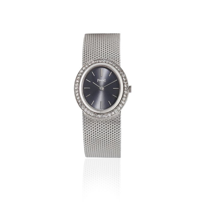Piaget. A lady's 18K white gold and diamond set manual wind bracelet watch Ref: 9337 B11, Circa 1990