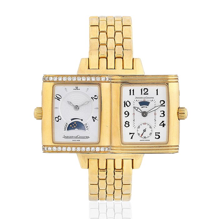 Jaeger-LeCoultre. An 18K gold and diamond set manual wind reversible rectangular bracelet watch with power reserve and night/day indication Reverso Night & Day, Ref: 296.1.74, Purchased 22nd July 2007