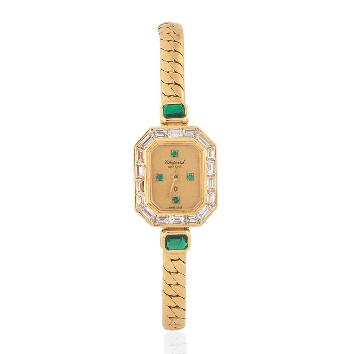 Chopard. A lady's 18K gold, diamond and emerald set quartz cocktail bracelet watch Ref: 104487, Circa 1980