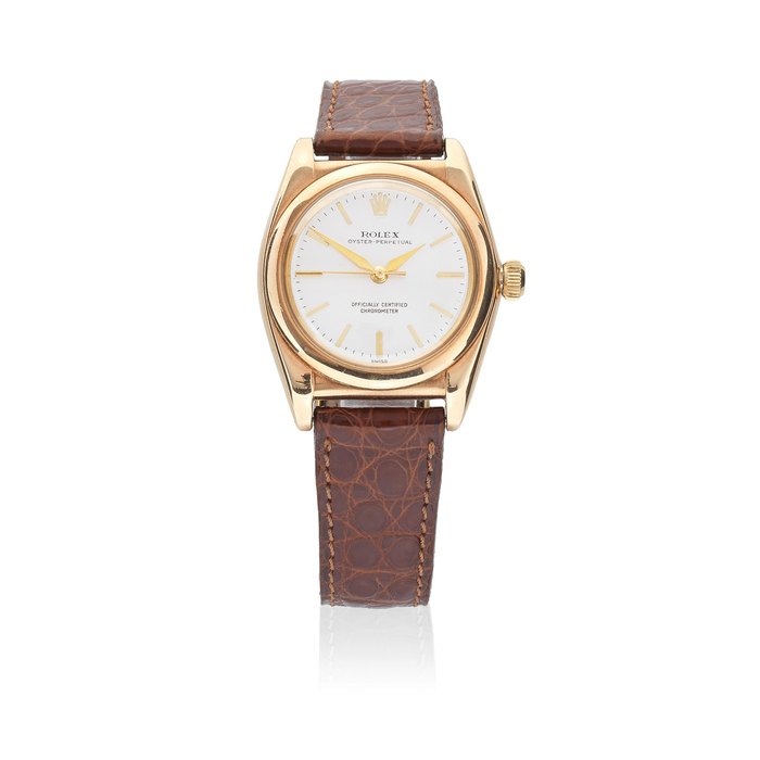 Rolex. A 14K gold automatic bubble back wristwatch Oyster Perpetual Ovetto, Ref: 3131, Circa 1946