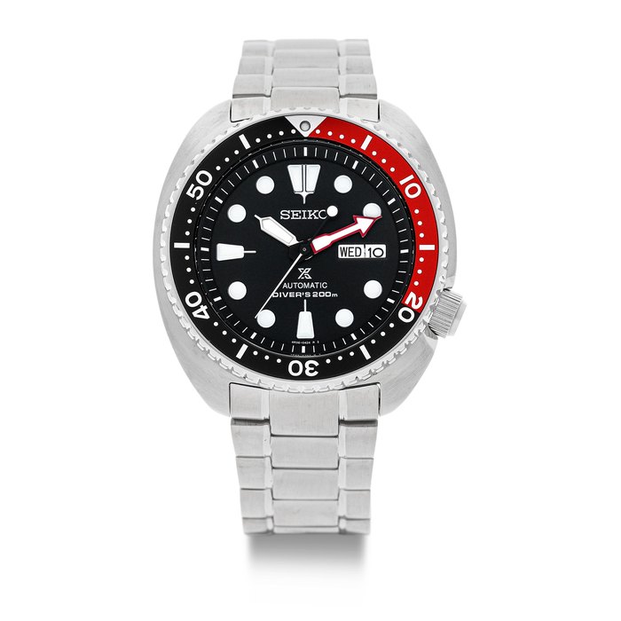 Seiko. A New Old Stock Prospex Stainless Steel "Black and Red Turtle" Automatic Diver's Bracelet Watch with day and date complete with maker's presentation box, swing tags, original gurantee and instruction manual