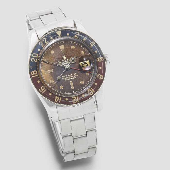 Rolex. A fine stainless steel automatic calendar dual time wristwatch with bakelite bezel GMT Master, Ref: 6542, Circa 1959
