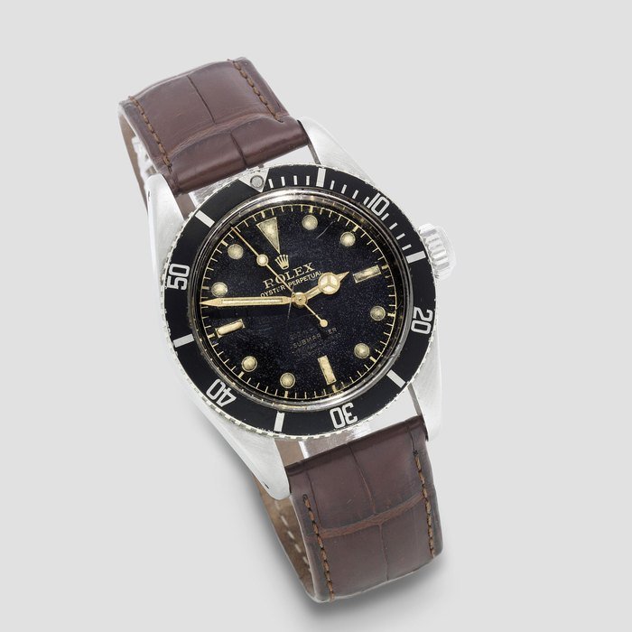 Rolex Rolex. A fine and rare stainless steel automatic wristwatch with gilt 4 line dial and big crown Submariner '4 Line', Ref: 6538, Circa 1956