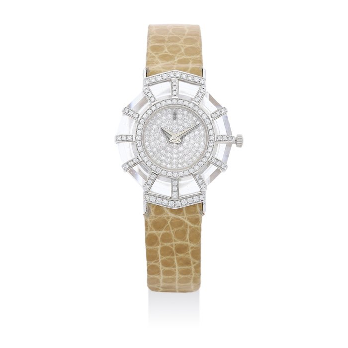 Corum. A White Gold and Diamond Quartz Wristwatch Ref. 24.781.69