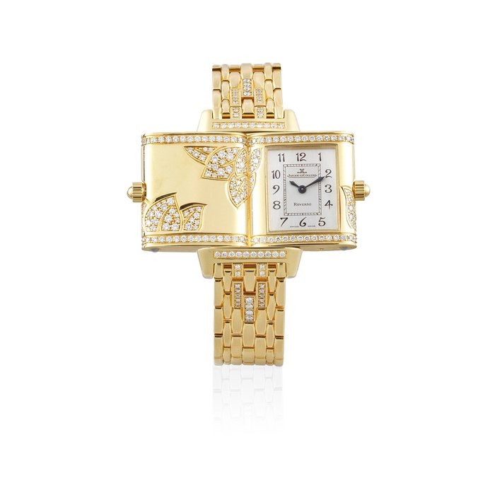 Jaeger-LeCoultre. A lady's 18K gold and diamond set quartz reversible rectangular bracelet watch Reverso, Ref: 265.1.08, Circa 2010