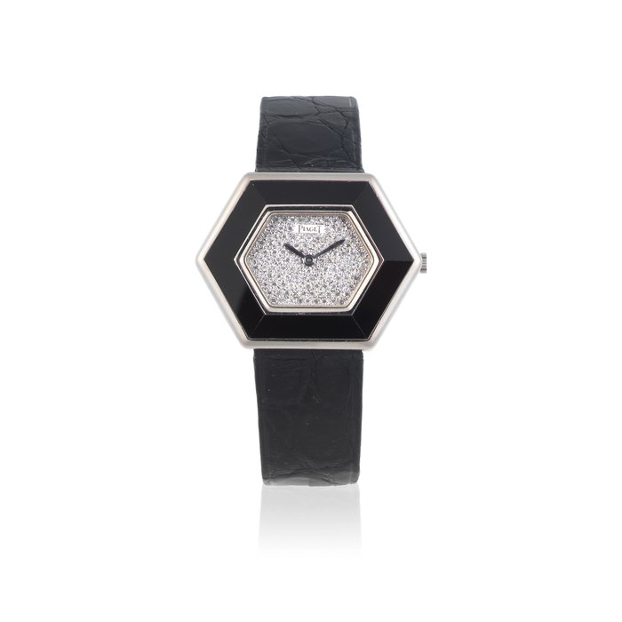 Piaget. An 18K white gold and onyx manual wind hexagonal wristwatch with diamond set dial Ref: 9523, Circa 1980