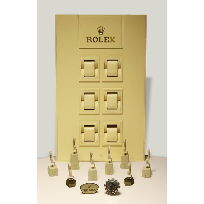 Rolex. A Collection of 13 Watch Stands and Display Objects
