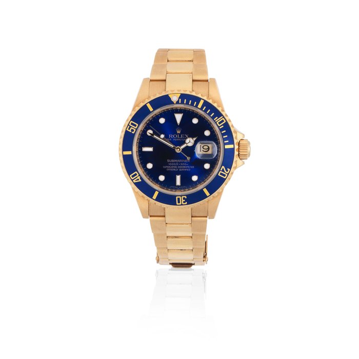 Rolex Rolex. An 18K gold automatic calendar bracelet watch Submariner, Ref: 16618T, Circa 2005, Price & Market Data