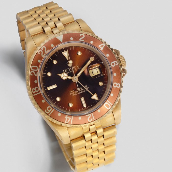 Rolex Rolex. An 18K gold automatic calendar bracelet watch with dual time zone GMT-Master, Ref: 16758, Circa 1981 · 16758