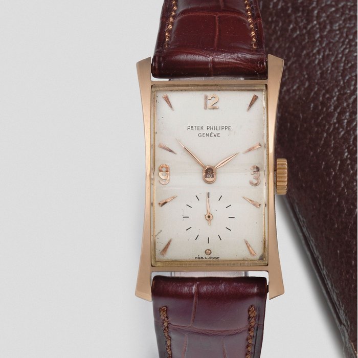 Patek Philippe. An 18K rose gold manual wind flared rectangular wristwatch Hourglass, Ref: 1593, Sold 9th December 1954