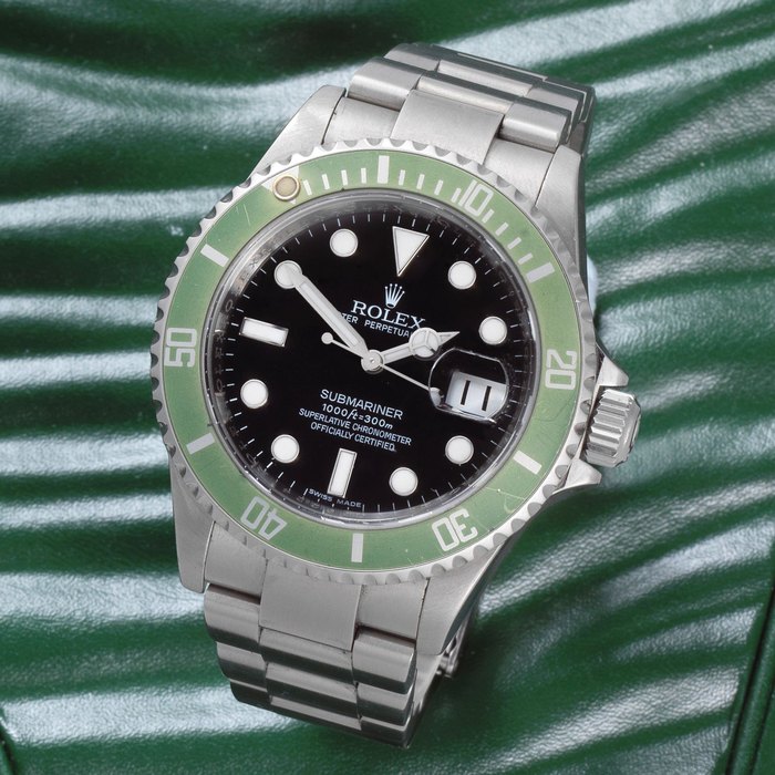 Rolex. A stainless steel automatic calendar bracelet watch with green bezel insert Submariner 'Kermit', Ref: 16610LV, Sold 2nd April 2016