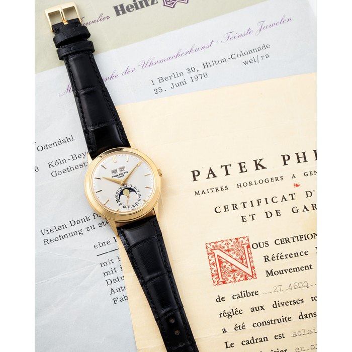 Patek Philippe. A 18K Gold Automatic Perpetual Calendar in German Wristwatch with Moon phases with box, Certificate of Origin and Invoice from the retailer Heinz Wipperfeld dated 25th of June 1970, Ref:3448, Case No.325492, Movement No.1119136